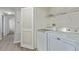 Laundry room with a washing machine and dryer and folding doors at 8250 N Grand Canyon Dr # 1084, Las Vegas, NV 89166
