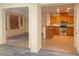 Open-concept kitchen featuring granite countertops and stainless steel appliances at 8374 Pioneer Way, Las Vegas, NV 89113