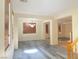 Bright open-plan living area featuring wood-look floors and ample natural light at 8374 Pioneer Way, Las Vegas, NV 89113
