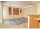 Spacious living room area featuring modern flooring and large windows at 8374 Pioneer Way, Las Vegas, NV 89113