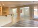 Open-concept living area showcasing modern flooring and seamless transition to other spaces at 8374 Pioneer Way, Las Vegas, NV 89113
