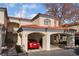 Inviting condo with a red tile roof and convenient covered parking, perfect for comfortable living at 8455 W Sahara Ave # 287, Las Vegas, NV 89117