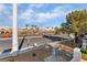 Exterior street view showcasing commercial buildings, palm trees, and desert landscaping at 8455 W Sahara Ave # 287, Las Vegas, NV 89117