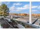 View of street lined with commercial buildings, sidewalks, and desert landscaping at 8455 W Sahara Ave # 287, Las Vegas, NV 89117