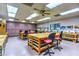 Bright art studio provides multiple workstations with storage and natural light to inspire creativity for residents at 8513 Glenmount Dr, Las Vegas, NV 89134