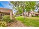 Lush backyard view featuring well-maintained landscaping and mature trees, a serene outdoor retreat at 8513 Glenmount Dr, Las Vegas, NV 89134