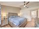 Comfortable bedroom features a bay window, soothing color palette, and natural light at 8513 Glenmount Dr, Las Vegas, NV 89134