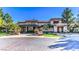 View of the attractive community building with manicured landscaping at 8513 Glenmount Dr, Las Vegas, NV 89134