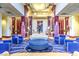 Spacious lobby with comfortable seating, decorative columns, and elegant decor at 8513 Glenmount Dr, Las Vegas, NV 89134