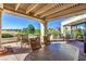 Outdoor seating area offers stunning golf course and mountain views for relaxation and enjoyment at 8513 Glenmount Dr, Las Vegas, NV 89134
