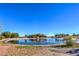 Beautiful community pond with water feature and walking path at 8513 Glenmount Dr, Las Vegas, NV 89134