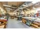 Equipped wood shop featuring a variety of tools and workbenches, ideal for woodworking projects and craftsmanship at 8513 Glenmount Dr, Las Vegas, NV 89134