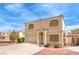 Charming two-story home with a well-maintained lawn, a two-car garage, and a concrete driveway at 8861 Hampton Green Ave, Las Vegas, NV 89129