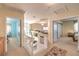 Upstairs hallway offering access to multiple rooms and a view of the lower level at 8861 Hampton Green Ave, Las Vegas, NV 89129