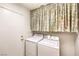Practical laundry area featuring a side-by-side washer and dryer at 8861 Hampton Green Ave, Las Vegas, NV 89129