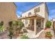 Charming patio with a covered pergola, an outdoor dining area and low maintenance landscaping at 8861 Hampton Green Ave, Las Vegas, NV 89129