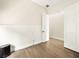 Clean bedroom includes wood floors, an open closet and plenty of natural light at 9037 Picket Fence Ave, Las Vegas, NV 89143