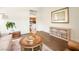 Open-concept living room with sleek hardwood flooring, and natural light at 9037 Picket Fence Ave, Las Vegas, NV 89143