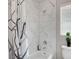 Modern bathroom featuring a stylish shower with beautiful tile work, and contemporary fixtures offering a serene space at 9413 Artesian Oak Ct, Las Vegas, NV 89149