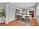 Bright dining room with a modern table set, shutters, and stylish decor at 9413 Artesian Oak Ct, Las Vegas, NV 89149