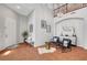 Stylish entryway featuring tile flooring, decorative accents, and comfortable seating near the home's front door at 9413 Artesian Oak Ct, Las Vegas, NV 89149