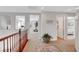 The upstairs hallway has carpet and views into other rooms of the house at 9413 Artesian Oak Ct, Las Vegas, NV 89149