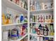 This pantry contains an assortment of different canned and packaged goods at 9413 Artesian Oak Ct, Las Vegas, NV 89149