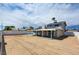 Large backyard with a covered patio, offering ample outdoor space and shade at 125 Sam Jonas Dr, Las Vegas, NV 89145