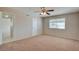 Neutral bedroom with plush carpet, ceiling fan, and window with blinds at 125 Sam Jonas Dr, Las Vegas, NV 89145
