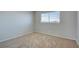 Bedroom with carpet flooring, and a window providing natural light at 125 Sam Jonas Dr, Las Vegas, NV 89145
