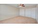 Comfortable bedroom with neutral tones, ceiling fan, and closet at 125 Sam Jonas Dr, Las Vegas, NV 89145