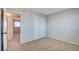 Bedroom with carpet, closet, and views of hallway at 125 Sam Jonas Dr, Las Vegas, NV 89145