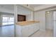 Open kitchen featuring white cabinets, wood countertops and sliding glass doors at 125 Sam Jonas Dr, Las Vegas, NV 89145