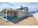 Covered patio with sliding glass doors, perfect for outdoor living and entertaining at 125 Sam Jonas Dr, Las Vegas, NV 89145
