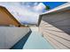 View of side yard and painted concrete, offering potential for storage or other outdoor uses at 125 Sam Jonas Dr, Las Vegas, NV 89145