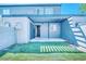 Backyard features shade structure and a small lawn area perfect for relaxing or entertaining at 1326 N Jones Blvd, Las Vegas, NV 89108