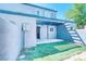 Landscaped backyard includes a small lawn, private fenced perimeter, and covered patio space at 1326 N Jones Blvd, Las Vegas, NV 89108