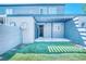 Backyard patio with shade cover, a small lawn, and a fenced perimeter at 1326 N Jones Blvd, Las Vegas, NV 89108