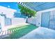 The backyard features artificial turf, a patio area, and a gated entrance at 1326 N Jones Blvd, Las Vegas, NV 89108