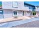 Charming two-story condo features well-maintained landscaping, stucco exterior, and a concrete pathway at 1326 N Jones Blvd, Las Vegas, NV 89108