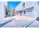 Inviting townhome featuring a well-maintained exterior with desert landscaping and a charming walkway at 1326 N Jones Blvd, Las Vegas, NV 89108