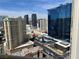 Expansive city view featuring the Hilton Grand Vacations and other surrounding buildings from the balcony of this unit at 135 E Harmon Ave # 3217, Las Vegas, NV 89109