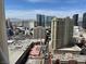 City view featuring several buildings and a parking garage from the balcony of this unit at 135 E Harmon Ave # 3217, Las Vegas, NV 89109