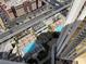 Overhead view of the pool area from the balcony of this unit at 135 E Harmon Ave # 3217, Las Vegas, NV 89109