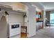 Image shows a room interior featuring a closet, safe, kitchenette, dining area and large windows at 135 E Harmon Ave # 3217, Las Vegas, NV 89109