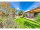 Picture of a landscaped backyard with a rock garden and artificial grass feature at 14 Hunt Valley Trl, Henderson, NV 89052