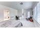 Open bedroom features a study area and ample natural light from shuttered windows at 14 Hunt Valley Trl, Henderson, NV 89052