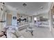 Spacious living room adjacent to kitchen and dining area offers an open floor plan perfect for entertaining at 14 Hunt Valley Trl, Henderson, NV 89052