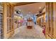View through doorway of the pro shop, featuring clothing and equipment displays at 14 Hunt Valley Trl, Henderson, NV 89052