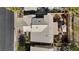 Overhead shot of a well-maintained home shows lush landscaping, a stylish roof, and a private backyard retreat at 1508 Sun Copper Dr, Las Vegas, NV 89117